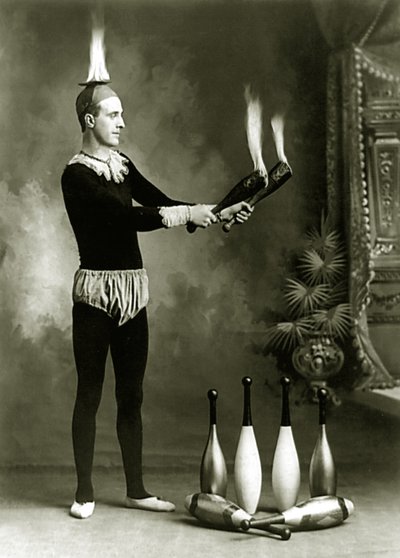 J.T. Doyle, Circus and Carnival Juggler with Flaming Pins and Bowl, c.1902 by J.E. Pasonault